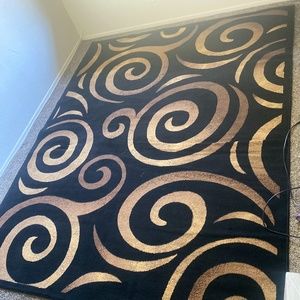 Black and gold rug